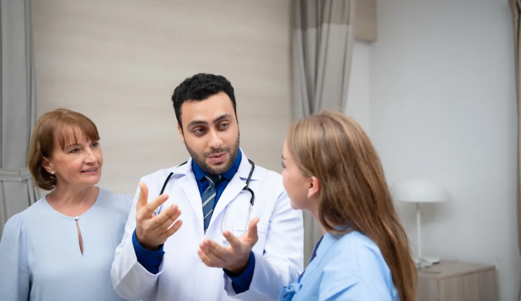 The doctor check daily in the sick room. After completing the physical examination, we talked about the progress of the treatment. Which has improved, Is ready to be discharged from the hospital soon.