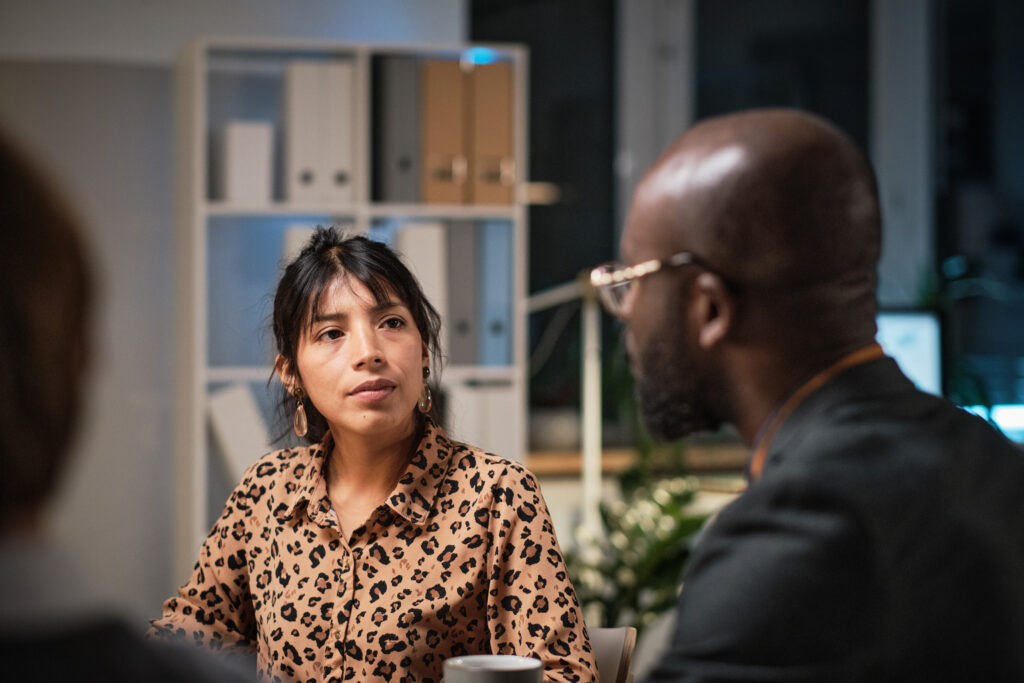 woman talking to colleague about narcan and how it works