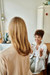 woman speaking to therapist